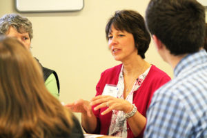 Students and faculty at a CIPE round table discussion
