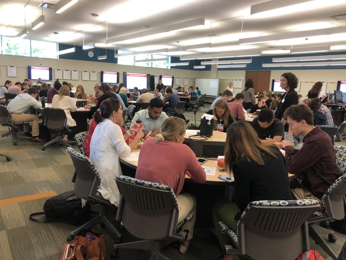Students working collaboratively in an active learning lab during a UW CIPE Learning Module