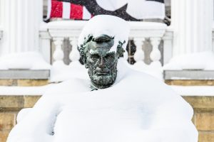 The Abraham Lincoln statue in front of Bascom Hall at the University of Wisconsin-Madison is covered in snow during a winter storm that brought several inches of snow to campus on Jan. 23, 2019. (Photo by Bryce Richter /UW-Madison)