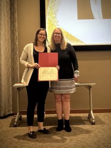 Dr. Beth Fields being recognized as a Joint Teaching Academy and UW CIPE Distinguished IPE Fellow.