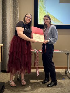 Julia Schiller being recognized as a UW IPE PoD Graduate.