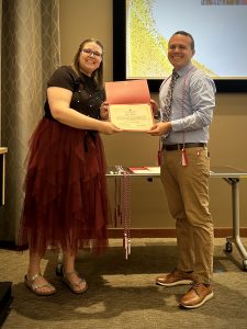 Ben Weber being recognized as a UW IPE PoD Graduate.