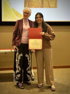 Uzma Khan accepting her Mischler IPE Scholarship.