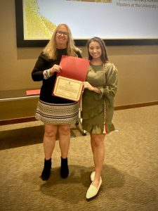 Hope Schier being recognized as a UW IPE PoD Graduate.