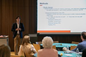 Ethan Elazegui presents his research at UW CIPE's 2026 Evening of Distinction.